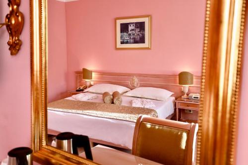En eller flere senge i et værelse på Marina Frapa Resort Rogoznica