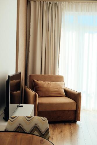Posezení v ubytování White Sails Residential Hotel