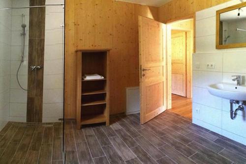 a bathroom with a sink and a toilet and a shower at Holiday resort Altaussee, Lichtersberg in Lichtersberg