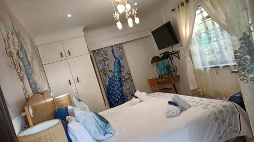 Postel nebo postele na pokoji v ubytování Queensburgh B&B or Self Catering