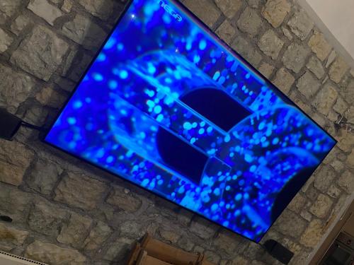 TV a/nebo společenská místnost v ubytování Arachova Vip smart chalet-Villa Eva 1