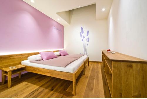 Una cama o camas en una habitación de Majerija