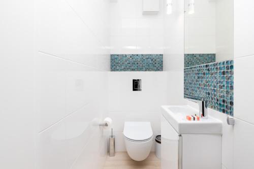 Et badeværelse på Apartments Awanport Gdynia by Renters