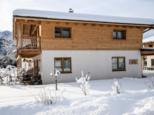 a log cabin in the snow with snow covered at Bergchalet Falkenstein, Inzell in Inzell
