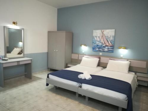 Postel nebo postele na pokoji v ubytování Stonegarden Studios