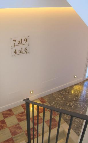 a sign on the wall in a room at Boutique Hotel Petit Sant Miquel in Calonge