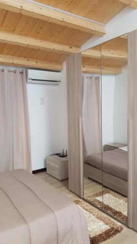 Ένα ή περισσότερα κρεβάτια σε δωμάτιο στο Casa dolce casa