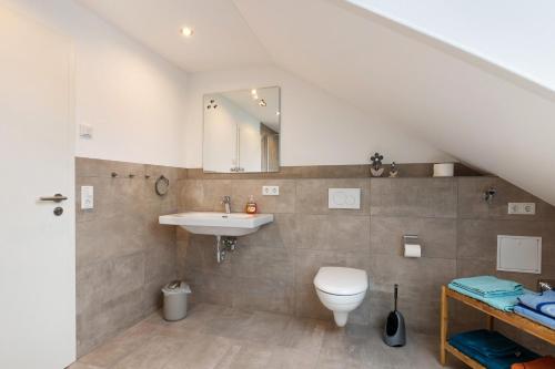 a bathroom with a sink and a toilet at kleine Auszeit in Albbruck