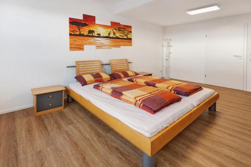 Una cama o camas en una habitación de kleine Auszeit