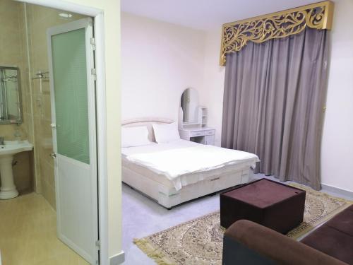 Giường trong phòng chung tại شاليهات الشاطيء beach chalets