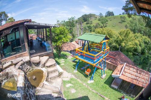 an aerial view of a playground with a slide at Pousada Estância Vip in Cunha