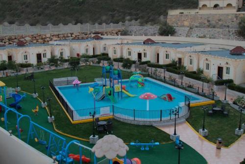 an aerial view of a water park at منتجع فيوري - الهدا in Taif