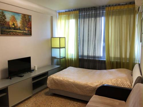 Cama o camas de una habitación en Nice Flats Noviy Arbat