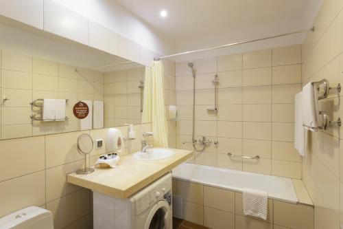 Ванная комната в Апарт-Отель Бревис