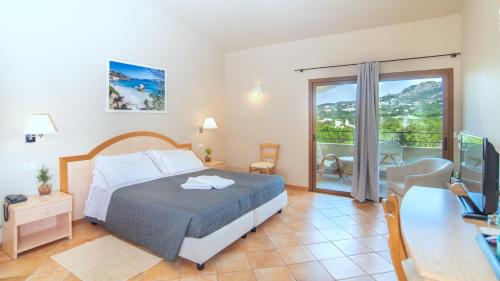 Postel nebo postele na pokoji v ubytování Hotel Nibaru