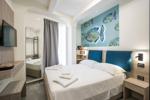 Postel nebo postele na pokoji v ubytování Carizza Rooms