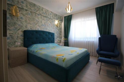 Llit o llits en una habitació de VIS RESIDENCE