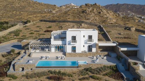 an aerial view of a house with a swimming pool at Soleila Mykonos Villa in Kalafatis