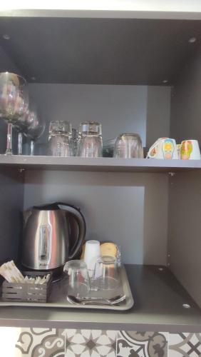 Кухня или мини-кухня в GH Rooms Catania
