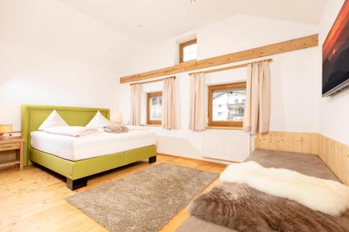 Posteľ alebo postele v izbe v ubytovaní holiday home, Strass im Zillertal