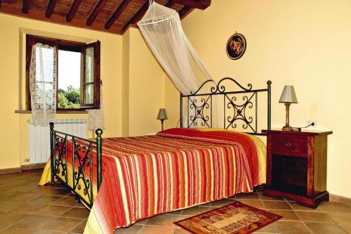 A bed or beds in a room at Villa in Montaione with Pool & Wine Tasting
