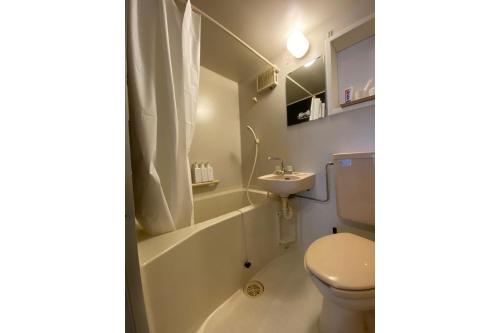a bathroom with a toilet and a sink at Nagasaki Sakayado Hitoma - Vacation STAY 16332v in Nagasaki
