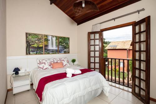 Postel nebo postele na pokoji v ubytování Acasa Diamantina - O aconchego em meio a natureza