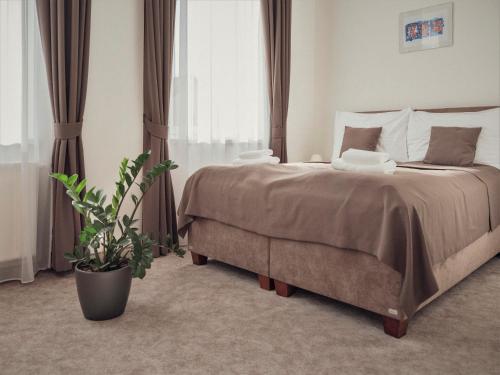 Postel nebo postele na pokoji v ubytování BIVIO hotel