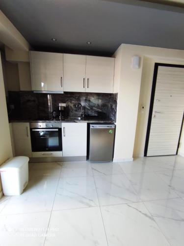 Η κουζίνα ή μικρή κουζίνα στο Premium apartman Family