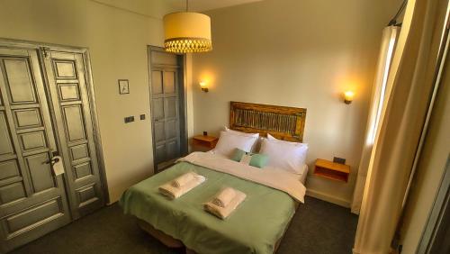 Postel nebo postele na pokoji v ubytování Variante Hotel