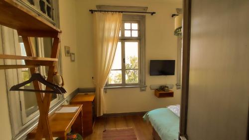 TV a/nebo společenská místnost v ubytování Variante Hotel