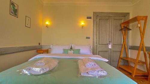 Postel nebo postele na pokoji v ubytování Variante Hotel