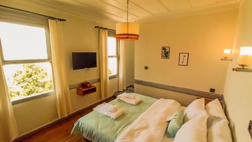 Postel nebo postele na pokoji v ubytování Variante Hotel