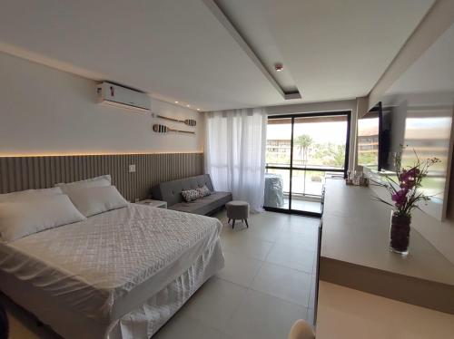 Krevet ili kreveti u jedinici u okviru objekta FLAT - ECO RESORT PRAIA DOS CARNEIROS