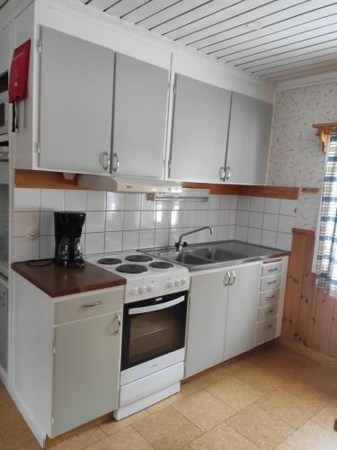 Kjøkken eller kjøkkenkrok på Ekesberget Stugby stuga 3