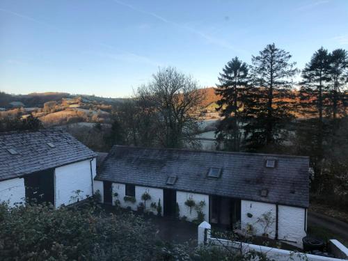 an aerial view of a house in the countryside at The Old Milking Parlour in Llandovery