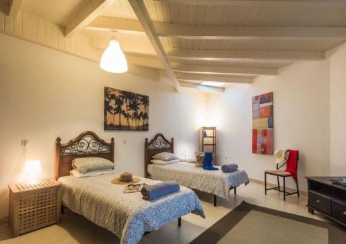 A bed or beds in a room at Villa Casa Bream