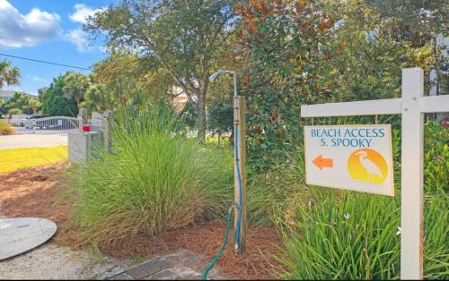 a sign in front of a cross on a street at Beach Blessings Luxe 30A Townhome 2BR 3Bath, Walk to Beach, Pool, Hot Tub in Santa Rosa Beach