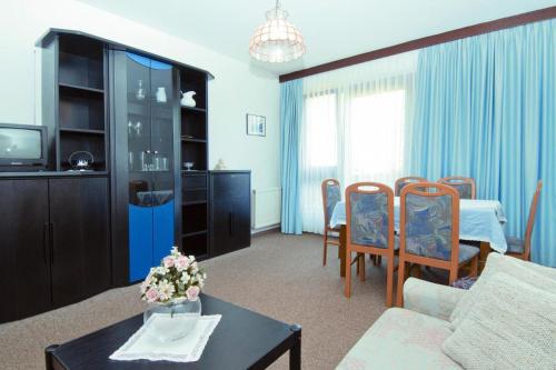 a living room with a couch and a table at Apartment in Oberdrauburg with parking space in Oberdrauburg