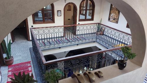 an overhead view of a building with a balcony at Auberge RIAD DLIM Tamraght in Tamraght Ouzdar