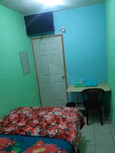 Postel nebo postele na pokoji v ubytování HOTEL EL EDEN