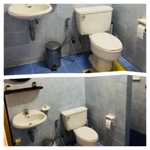 a bathroom with a toilet and a sink at Nicha Pool Villa in Hua Hin