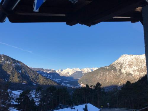 a view of a mountain range with snow covered mountains at Ferienhaus Nagele in Oetz