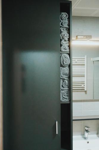 Ванная комната в MERDZ Spa & Fitness Sky Apartment