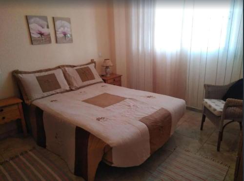 Posteľ alebo postele v izbe v ubytovaní Apartment 350 meters from Playa del Cura