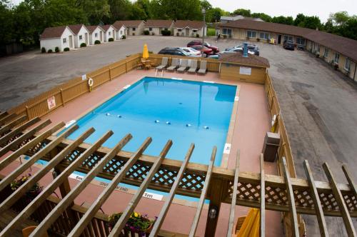 an overhead view of a swimming pool at a building at Falls Manor Resort in Niagara Falls