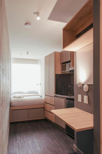 Cuisine ou kitchenette dans l'établissement UMA Suites Chia