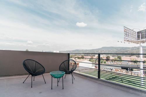 En balkon eller terrasse på UMA Suites Chia