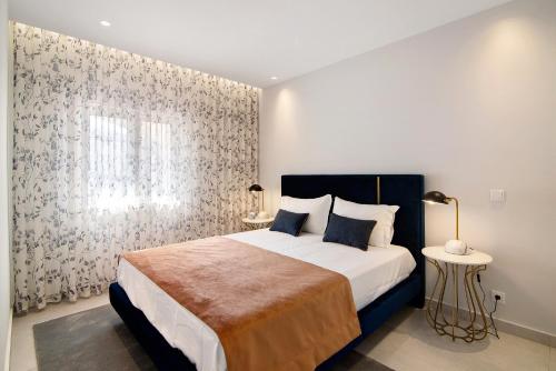 Postel nebo postele na pokoji v ubytování Apartamento Albufeira Prestige