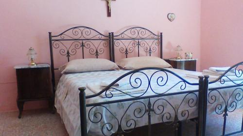 Casetta Stellata Monteforte tesisinde bir odada yatak veya yataklar